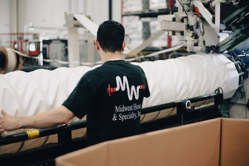 Midwest Hose employee working in ducting manufacture location